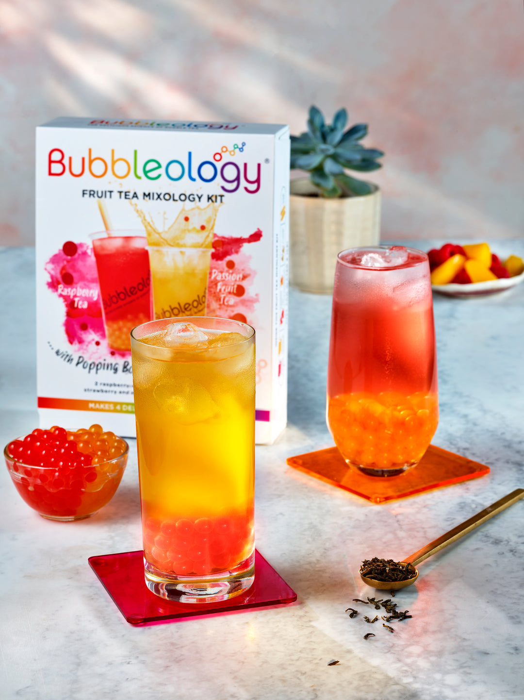 Bubbleology Fruit Tea Lifestyle Imagery - Passion Fruit Bubble Tea and Raspberry Bubble Tea